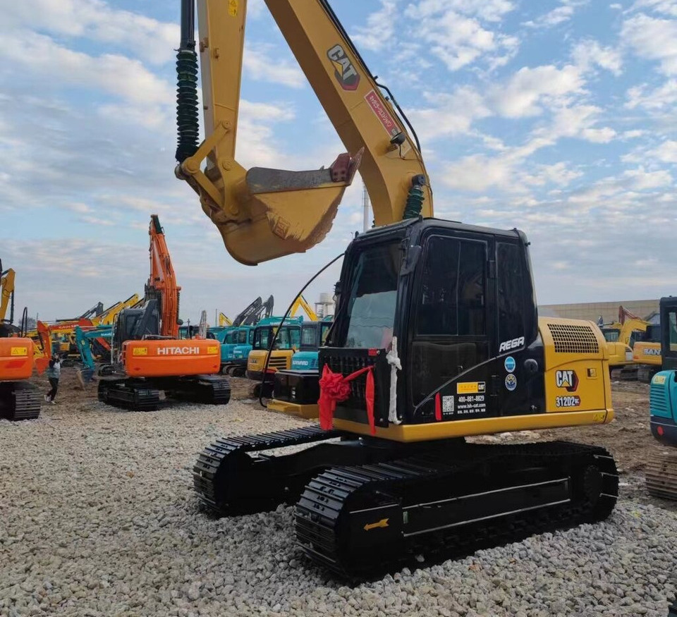 Caterpillar 312D - מחפר סורק: תמונה 1 Caterpillar 312D - מחפר סורק: תמונה 1
