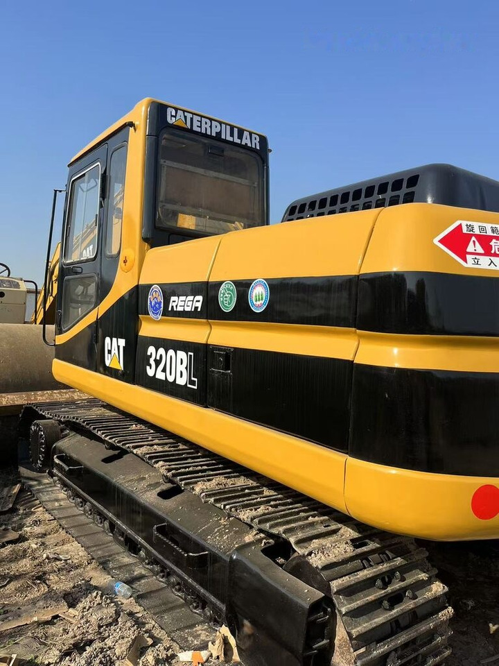 מחפר סורק Caterpillar 320BL: תמונה 7