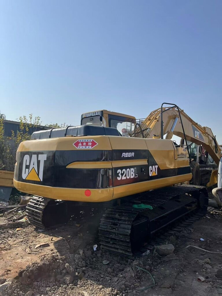 Caterpillar 320BL - מחפר סורק: תמונה 1 Caterpillar 320BL - מחפר סורק: תמונה 1