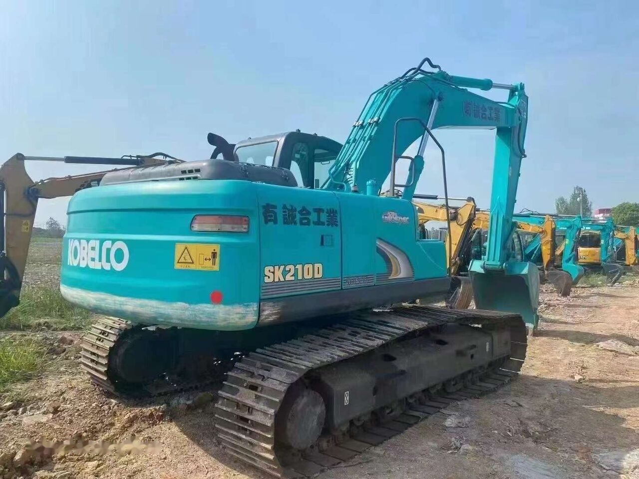 Kobelco SK210D - מחפר סורק: תמונה 2 Kobelco SK210D - מחפר סורק: תמונה 2