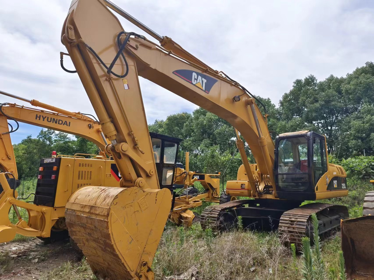 CATERPILLAR CAT 325C - מחפר סורק: תמונה 1 CATERPILLAR CAT 325C - מחפר סורק: תמונה 1