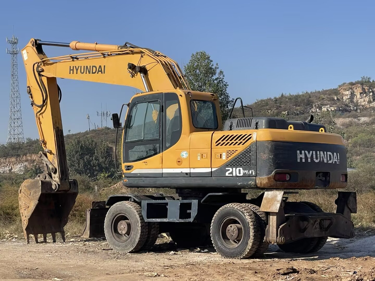 HYUNDAI 210W-9 - מחפר גלגלים: תמונה 1 HYUNDAI 210W-9 - מחפר גלגלים: תמונה 1
