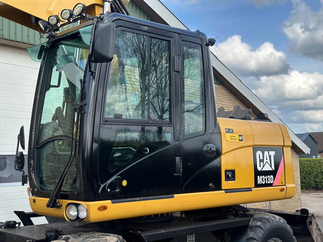 Caterpillar M313D - מחפר גלגלים: תמונה 5 Caterpillar M313D - מחפר גלגלים: תמונה 5