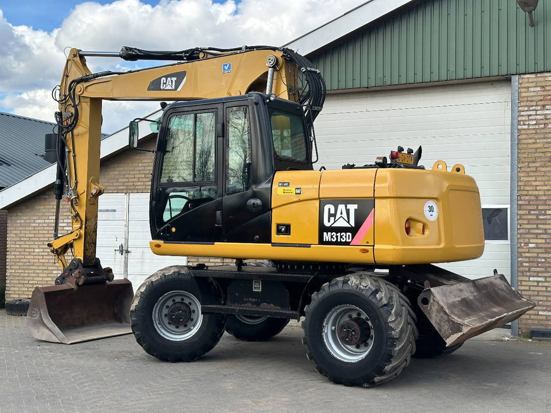 Caterpillar M313D - מחפר גלגלים: תמונה 4 Caterpillar M313D - מחפר גלגלים: תמונה 4