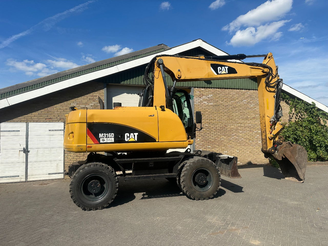 Caterpillar M316D - מעמיס גלגלים: תמונה 5 Caterpillar M316D - מעמיס גלגלים: תמונה 5