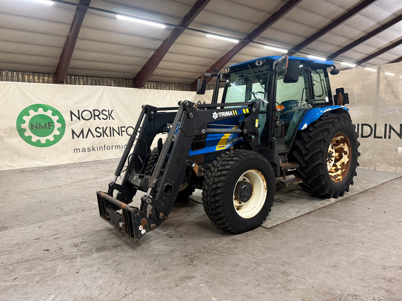 New Holland T5060 - טרקטור חקלאי: תמונה 1 New Holland T5060 - טרקטור חקלאי: תמונה 1