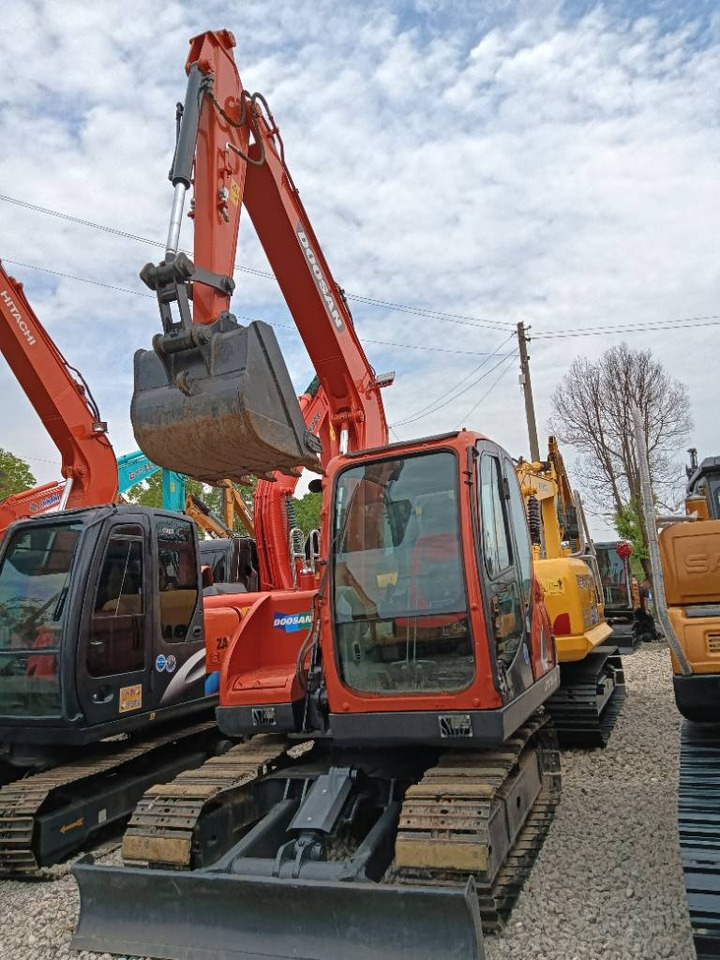 Doosan DX 75 - מחפר סורק: תמונה 1 Doosan DX 75 - מחפר סורק: תמונה 1