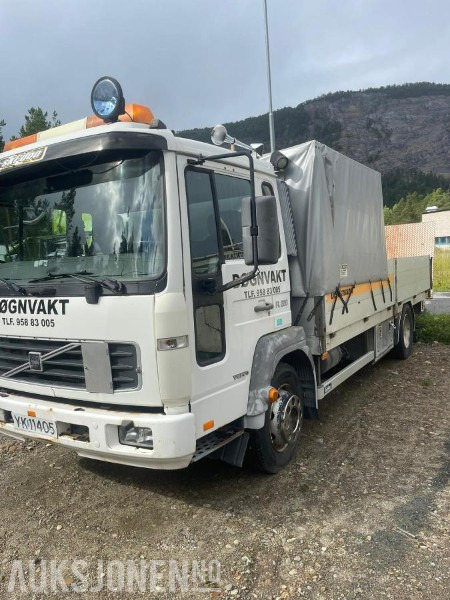 2000 Volvo FL 608 - Verkstedbil med kompressor som drives av en bensinmotor. - משאית צד נופל/ שטוחה: תמונה 1 2000 Volvo FL 608 - Verkstedbil med kompressor som drives av en bensinmotor. - משאית צד נופל/ שטוחה: תמונה 1