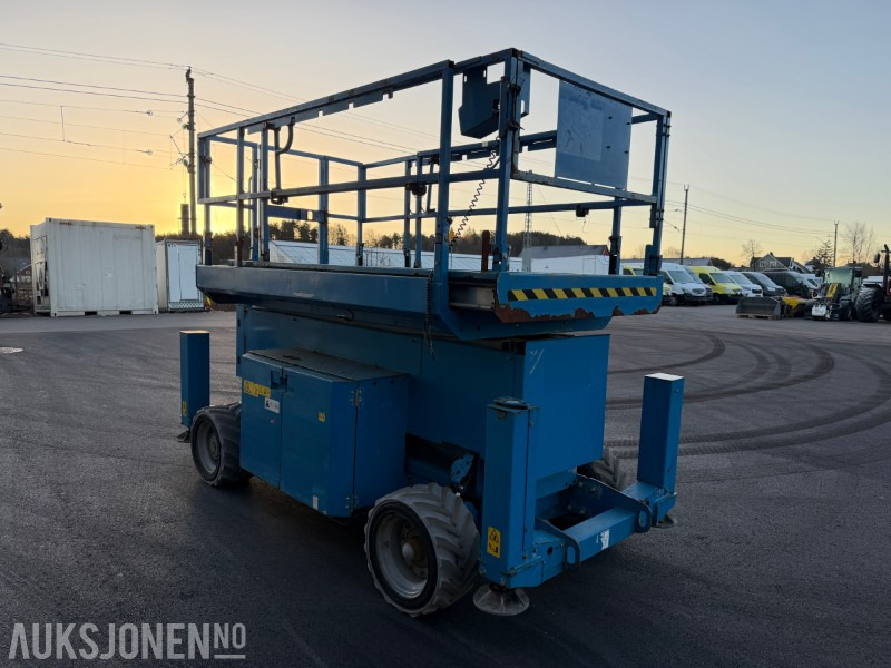 2012 Genie GS-4069 terrenggående sakselift med arbeidshøyde på 14 meter og løftekapasitet på 363 kg - פלטפורמה אווירית: תמונה 4 2012 Genie GS-4069 terrenggående sakselift med arbeidshøyde på 14 meter og løftekapasitet på 363 kg - פלטפורמה אווירית: תמונה 4