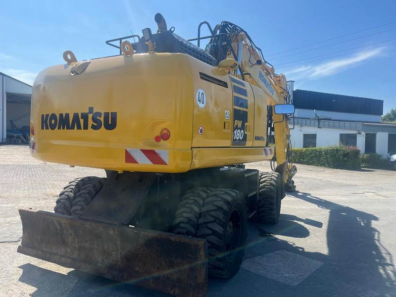 Komatsu PW180-10 - מחפר גלגלים: תמונה 1 Komatsu PW180-10 - מחפר גלגלים: תמונה 1