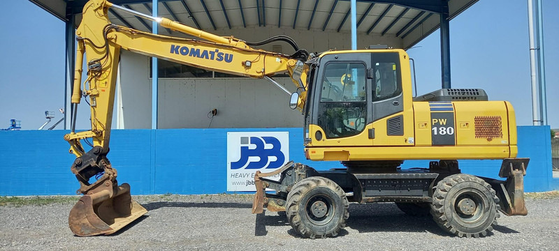 Komatsu PW180-7EO - מחפר גלגלים: תמונה 1 Komatsu PW180-7EO - מחפר גלגלים: תמונה 1