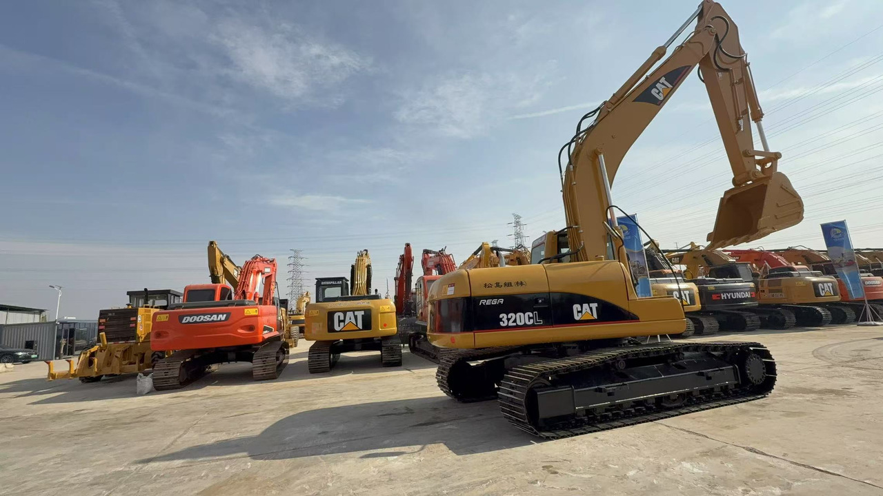 Cat 320cl excavator - מחפר סורק: תמונה 1 Cat 320cl excavator - מחפר סורק: תמונה 1