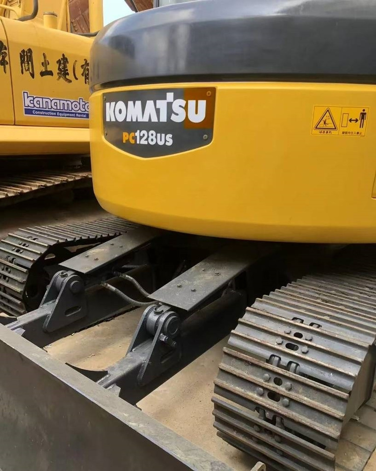 Komatsu 128 US - מחפר סורק: תמונה 2 Komatsu 128 US - מחפר סורק: תמונה 2