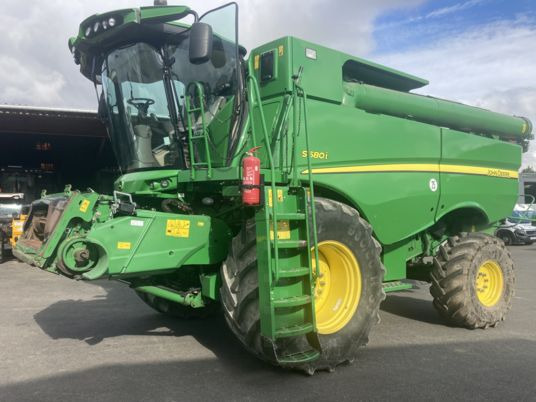 John Deere S680 - מקצרת קומבינה: תמונה 1 John Deere S680 - מקצרת קומבינה: תמונה 1