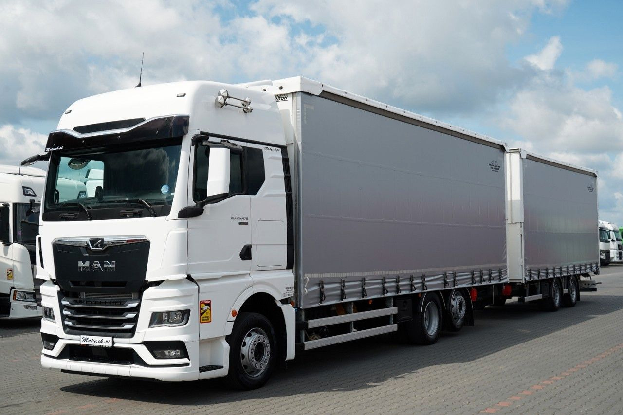 MAN TGX 26.470 / ZESTAW TANDEM 120 M3 / PRZEJAZDOWY - משאית וילונות צד: תמונה 1 MAN TGX 26.470 / ZESTAW TANDEM 120 M3 / PRZEJAZDOWY - משאית וילונות צד: תמונה 1