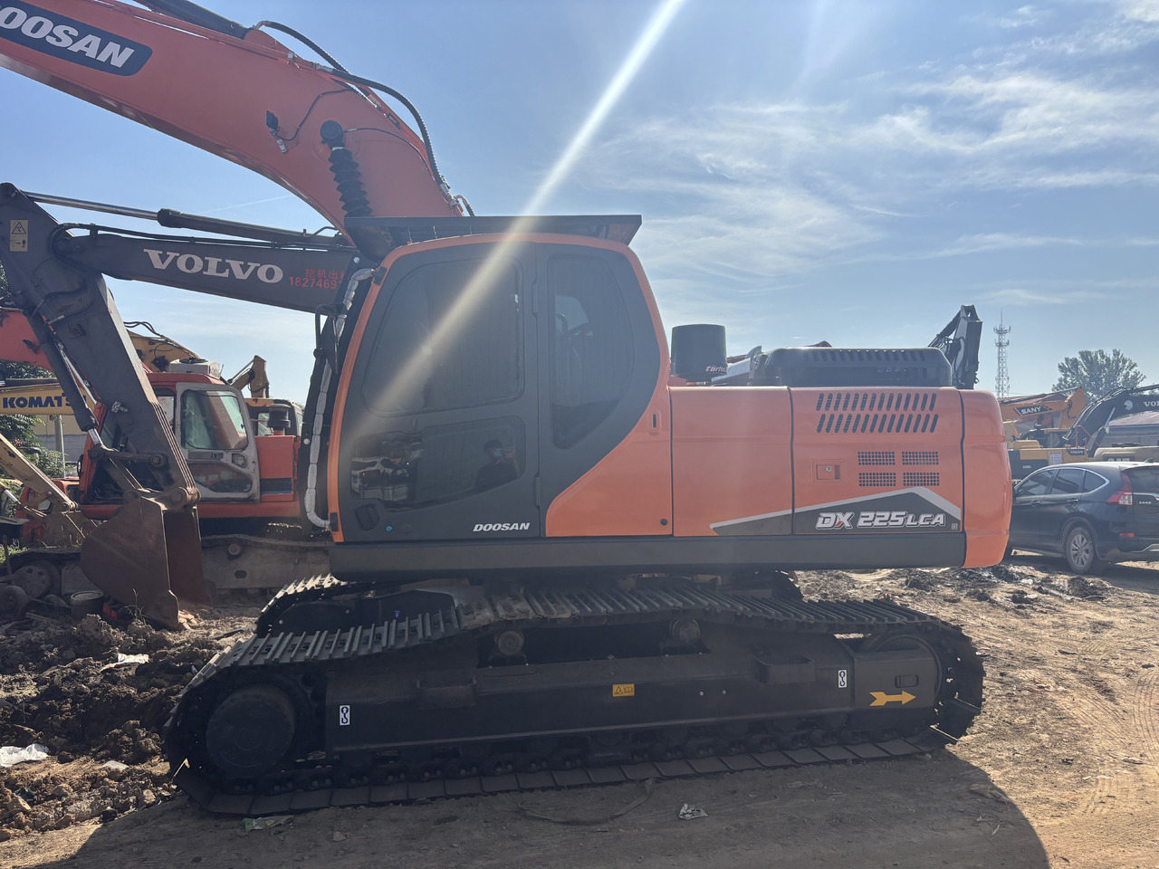 DOOSAN Korea imports doosan DX225 - מחפר סורק: תמונה 1 DOOSAN Korea imports doosan DX225 - מחפר סורק: תמונה 1