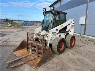 Bobcat A 220 - מעמיס היגוי החלקה: תמונה 1 Bobcat A 220 - מעמיס היגוי החלקה: תמונה 1