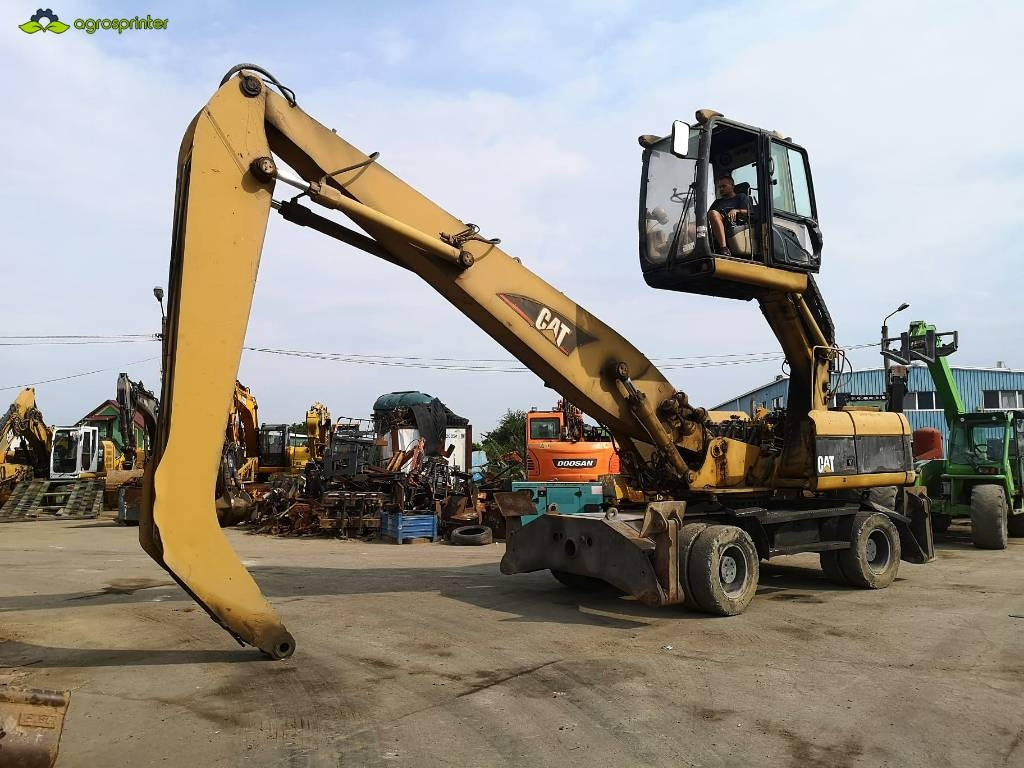 CAT M 322 C MH - מטפל בפסולת/ תעשייתי: תמונה 1 CAT M 322 C MH - מטפל בפסולת/ תעשייתי: תמונה 1