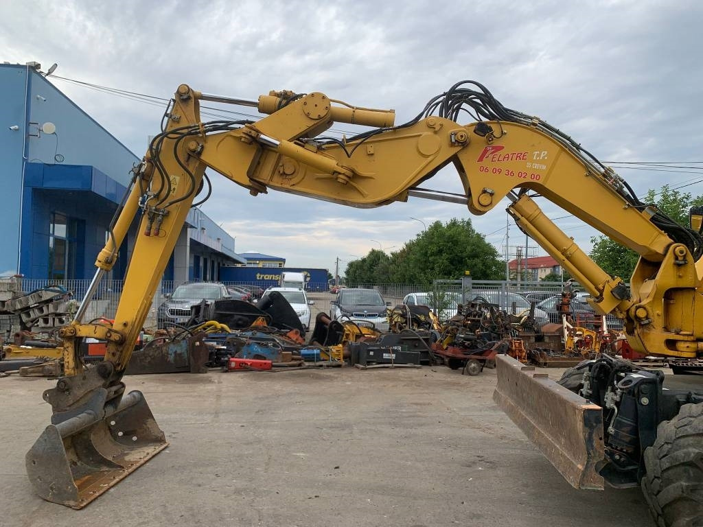 Komatsu PW118MR-11W - מחפר גלגלים: תמונה 3 Komatsu PW118MR-11W - מחפר גלגלים: תמונה 3