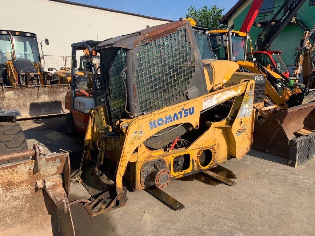 Komatsu SK 714 FOR PARTS - מעמיס היגוי החלקה: תמונה 1 Komatsu SK 714 FOR PARTS - מעמיס היגוי החלקה: תמונה 1