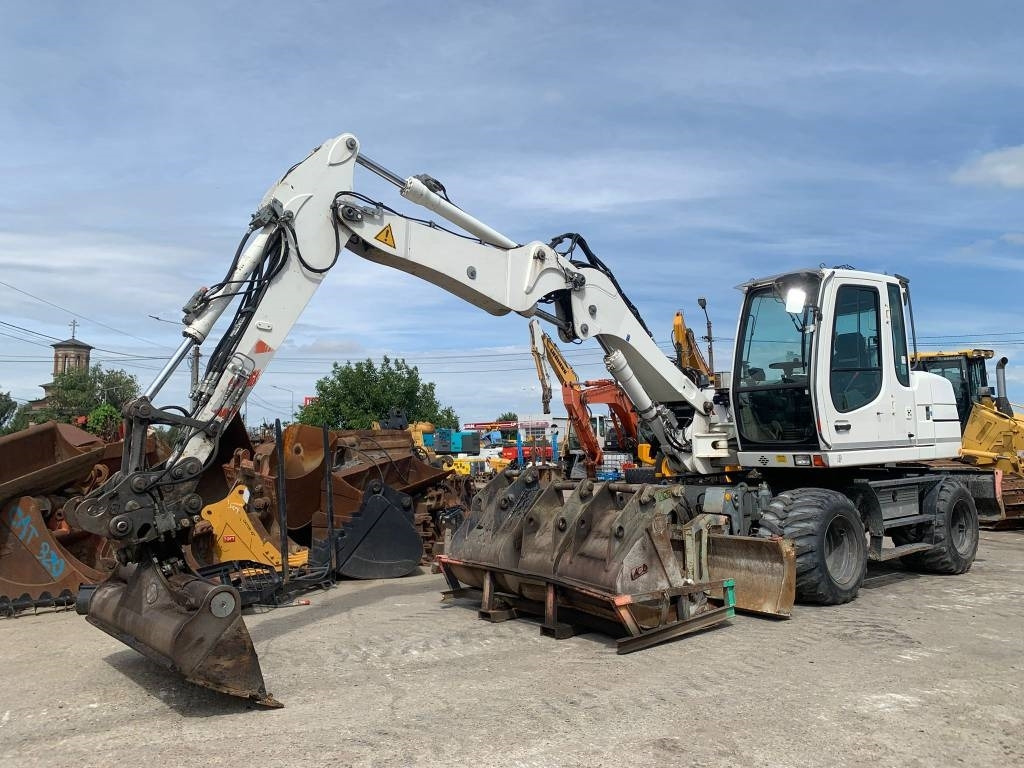 Liebherr A 311 Litronic - מחפר גלגלים: תמונה 1 Liebherr A 311 Litronic - מחפר גלגלים: תמונה 1