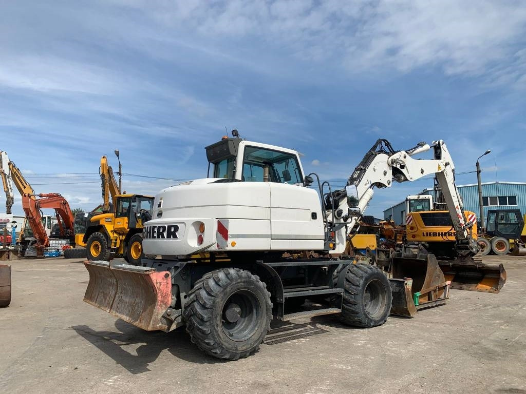 Liebherr A 311 Litronic - מחפר גלגלים: תמונה 4 Liebherr A 311 Litronic - מחפר גלגלים: תמונה 4