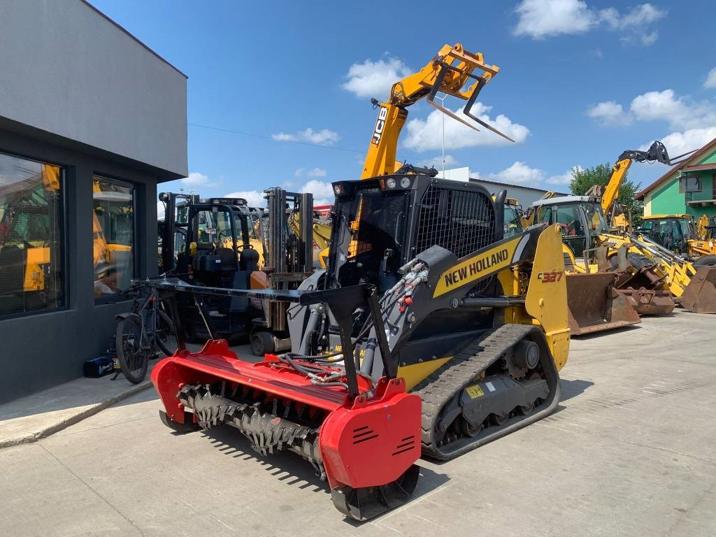 New Holland C327 - מעמיס היגוי החלקה: תמונה 1 New Holland C327 - מעמיס היגוי החלקה: תמונה 1