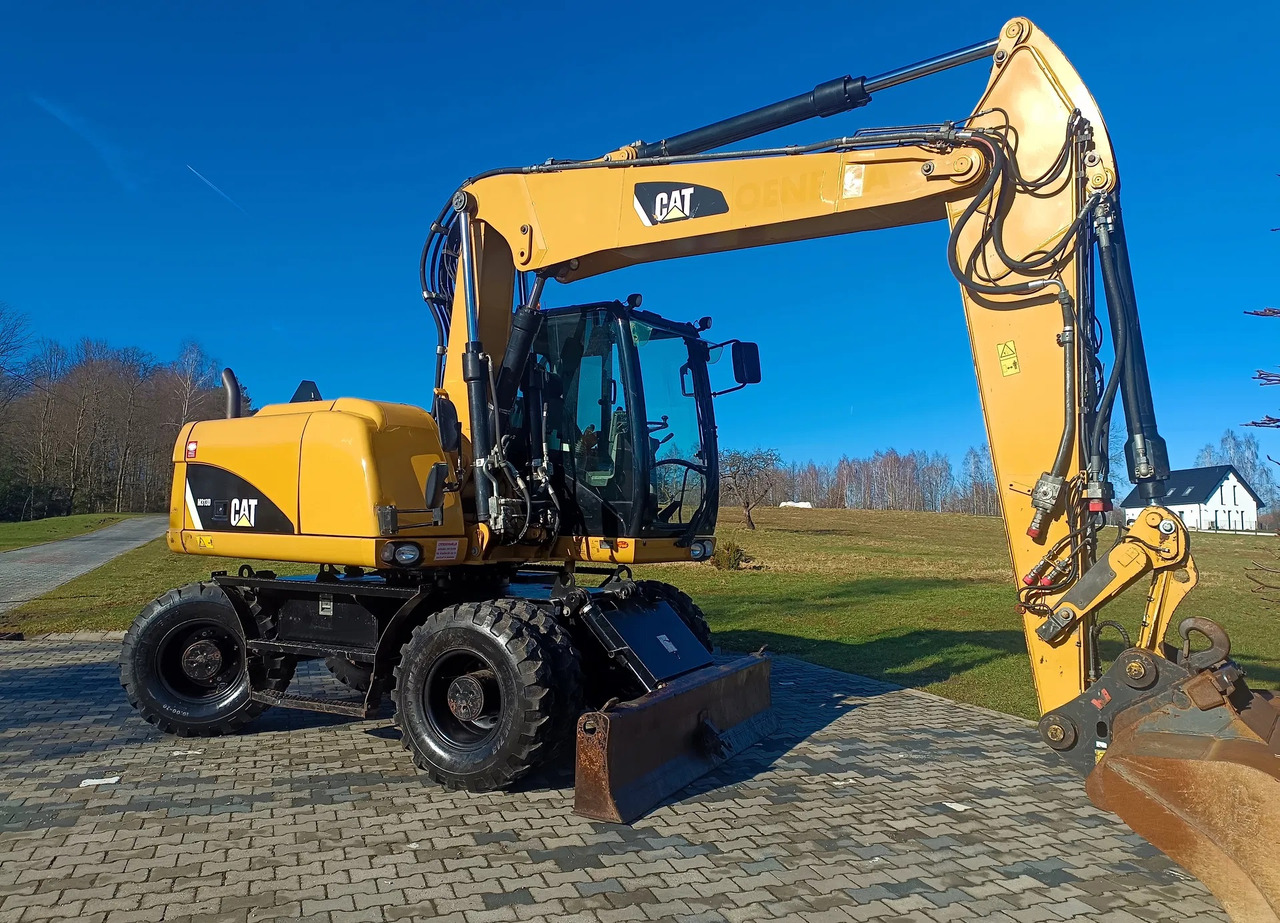 CATERPILLAR M313D - מחפר גלגלים: תמונה 2 CATERPILLAR M313D - מחפר גלגלים: תמונה 2