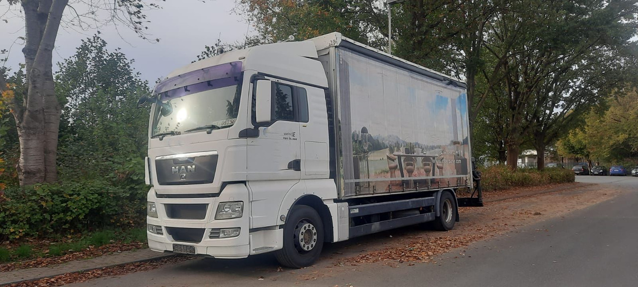 MAN TGX 18.360PS 4x2 G.Haus Kran+Funk - משאית צד נופל/ שטוחה, משאית מנוף: תמונה 1 MAN TGX 18.360PS 4x2 G.Haus Kran+Funk - משאית צד נופל/ שטוחה, משאית מנוף: תמונה 1