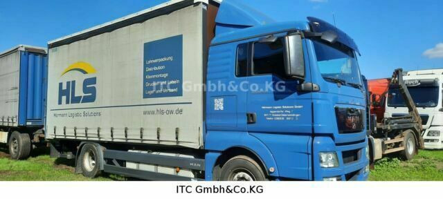 MAN TGX18.400 Pritsche Plane - משאית וילונות צד: תמונה 1 MAN TGX18.400 Pritsche Plane - משאית וילונות צד: תמונה 1