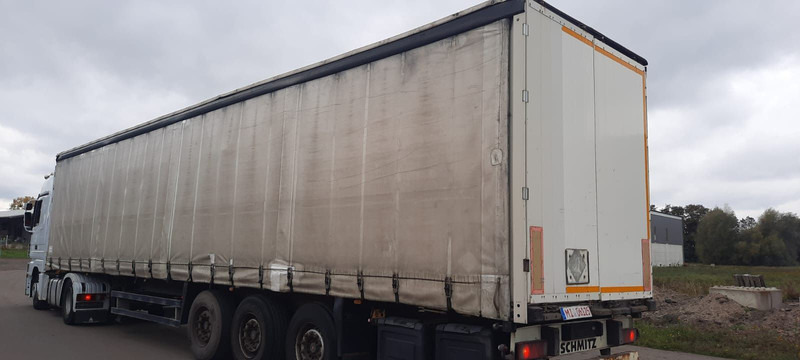 Schmitz Cargobull 3-Achser Pritsche Plane - סמיטריילר עם וילונות צד: תמונה 2 Schmitz Cargobull 3-Achser Pritsche Plane - סמיטריילר עם וילונות צד: תמונה 2