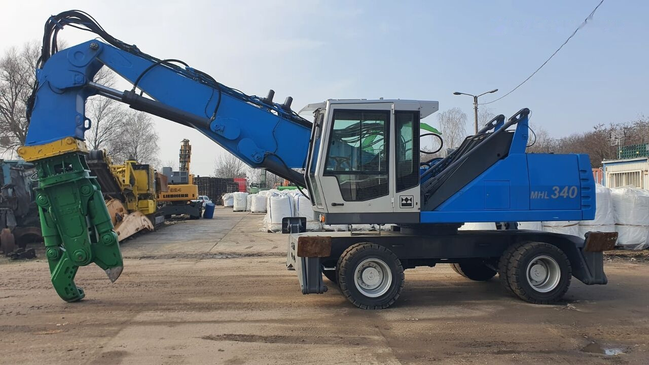 Fuchs MHL 340D FQC + LST 3to shear - מטפל בפסולת/ תעשייתי: תמונה 1 Fuchs MHL 340D FQC + LST 3to shear - מטפל בפסולת/ תעשייתי: תמונה 1