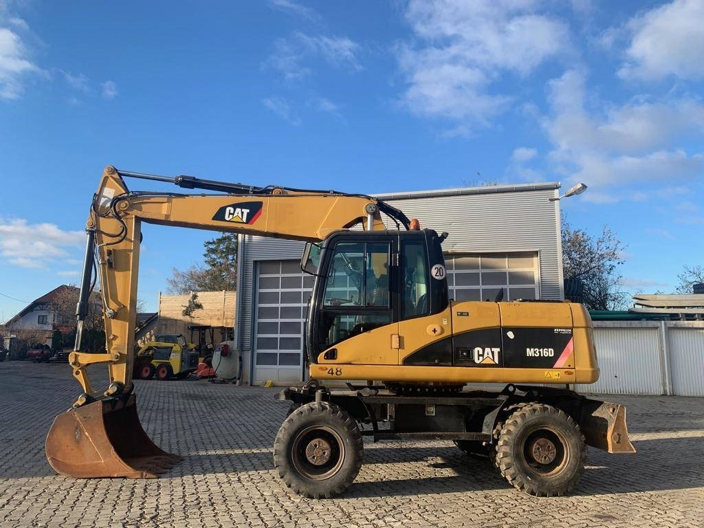 CAT M 316 D - מחפר גלגלים: תמונה 2 CAT M 316 D - מחפר גלגלים: תמונה 2