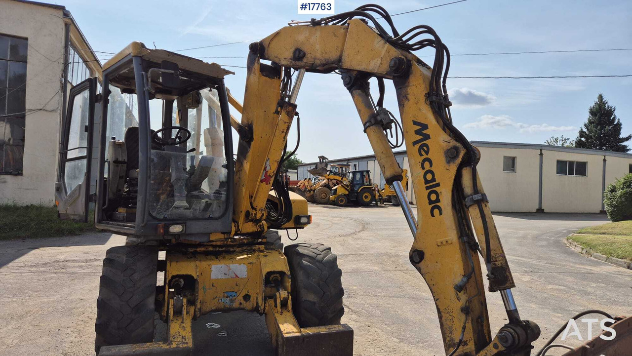 MECALAC 12MX wheeled excavator (1996) - מחפר גלגלים: תמונה 3 MECALAC 12MX wheeled excavator (1996) - מחפר גלגלים: תמונה 3