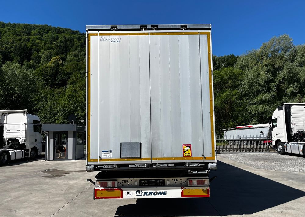 Krone Firanka Coilmulde // 9m // Alu Drzwi // Ażury // Oś podnoszona // - סמיטריילר עם וילונות צד: תמונה 2 Krone Firanka Coilmulde // 9m // Alu Drzwi // Ażury // Oś podnoszona // - סמיטריילר עם וילונות צד: תמונה 2