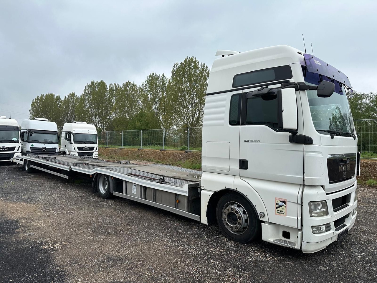 MAN TGX 18.360 Flachzug*3er*XXL*Winde*Retarder - משאית הובלה אוטומטית: תמונה 1 MAN TGX 18.360 Flachzug*3er*XXL*Winde*Retarder - משאית הובלה אוטומטית: תמונה 1