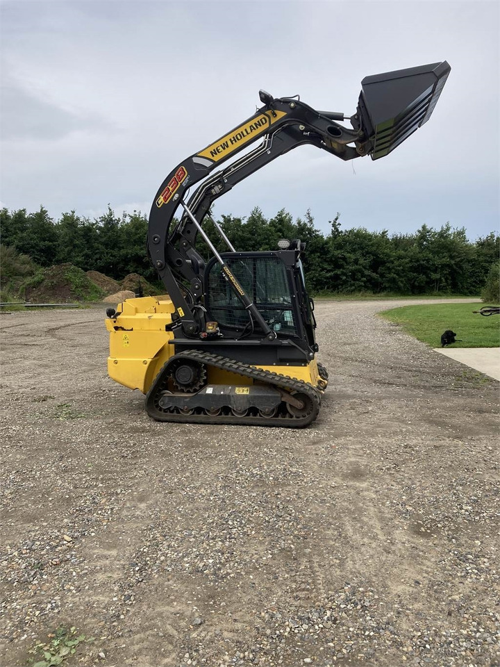 New Holland C 238 LOADER - מעמיס רצועות קומפקטי: תמונה 2 New Holland C 238 LOADER - מעמיס רצועות קומפקטי: תמונה 2