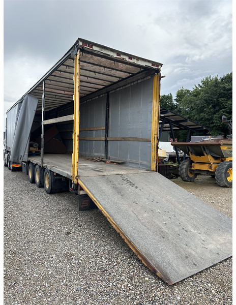 Schmitz Cargobull Machine transport trailer with bag ramp - סמיטריילר עם מטען נמוך: תמונה 5 Schmitz Cargobull Machine transport trailer with bag ramp - סמיטריילר עם מטען נמוך: תמונה 5