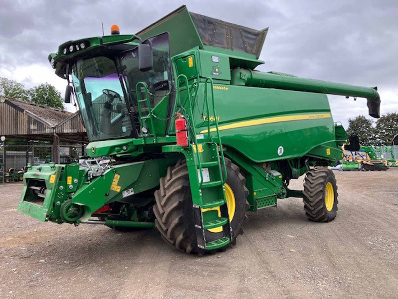 John Deere T560i HillMaster - מקצרת קומבינה: תמונה 1 John Deere T560i HillMaster - מקצרת קומבינה: תמונה 1
