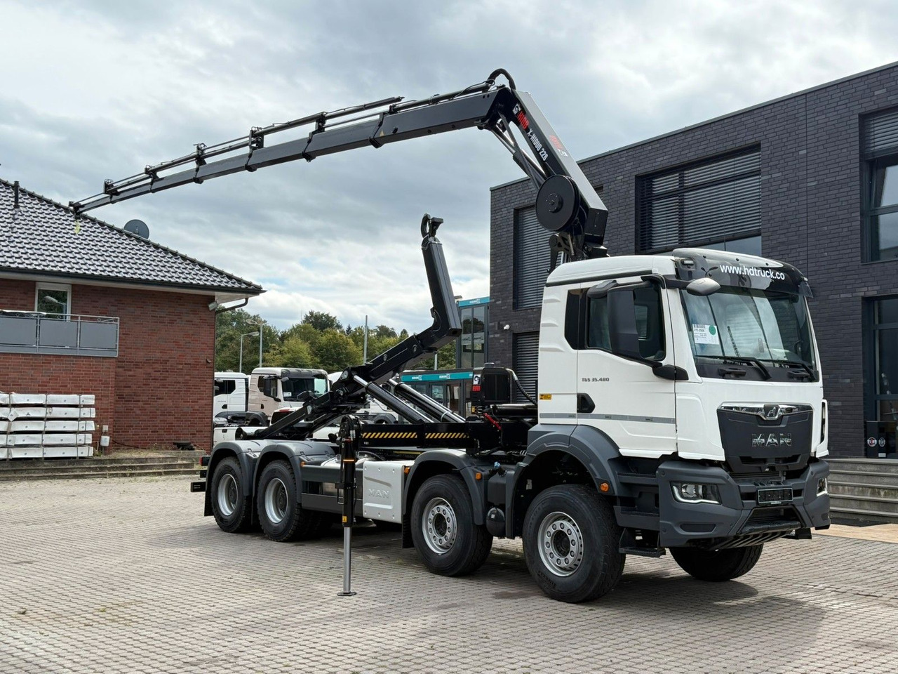 MAN TGS 35.480 8x4 Abrollkipper + Kran HIAB 228-6 - משאית הרמת וו, משאית מנוף: תמונה 1 MAN TGS 35.480 8x4 Abrollkipper + Kran HIAB 228-6 - משאית הרמת וו, משאית מנוף: תמונה 1