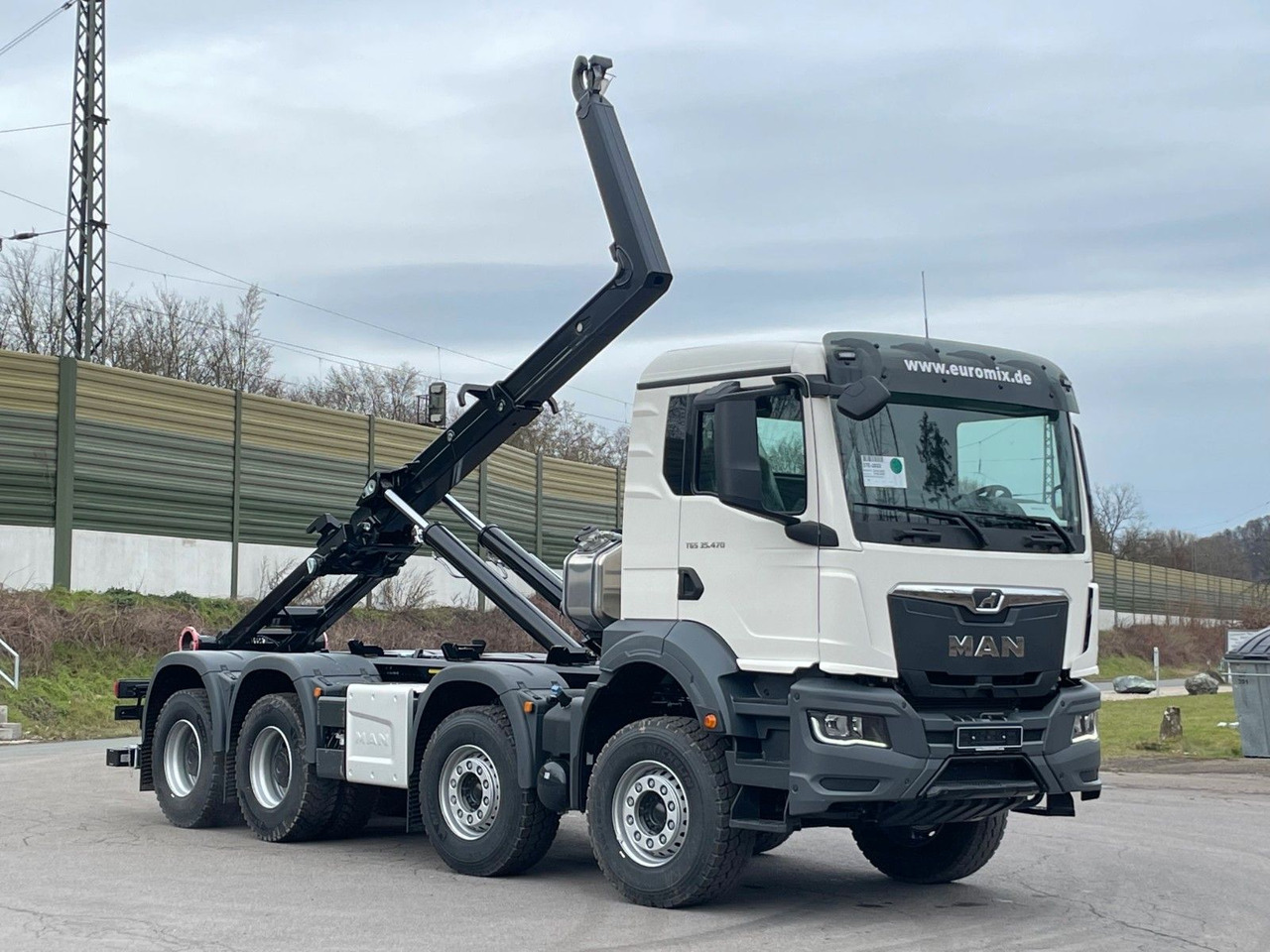 MAN TGS 35.480 8x4 Euro6e Hiab MultLift Abrollkipper - משאית הרמת וו, משאית מנוף: תמונה 1 MAN TGS 35.480 8x4 Euro6e Hiab MultLift Abrollkipper - משאית הרמת וו, משאית מנוף: תמונה 1
