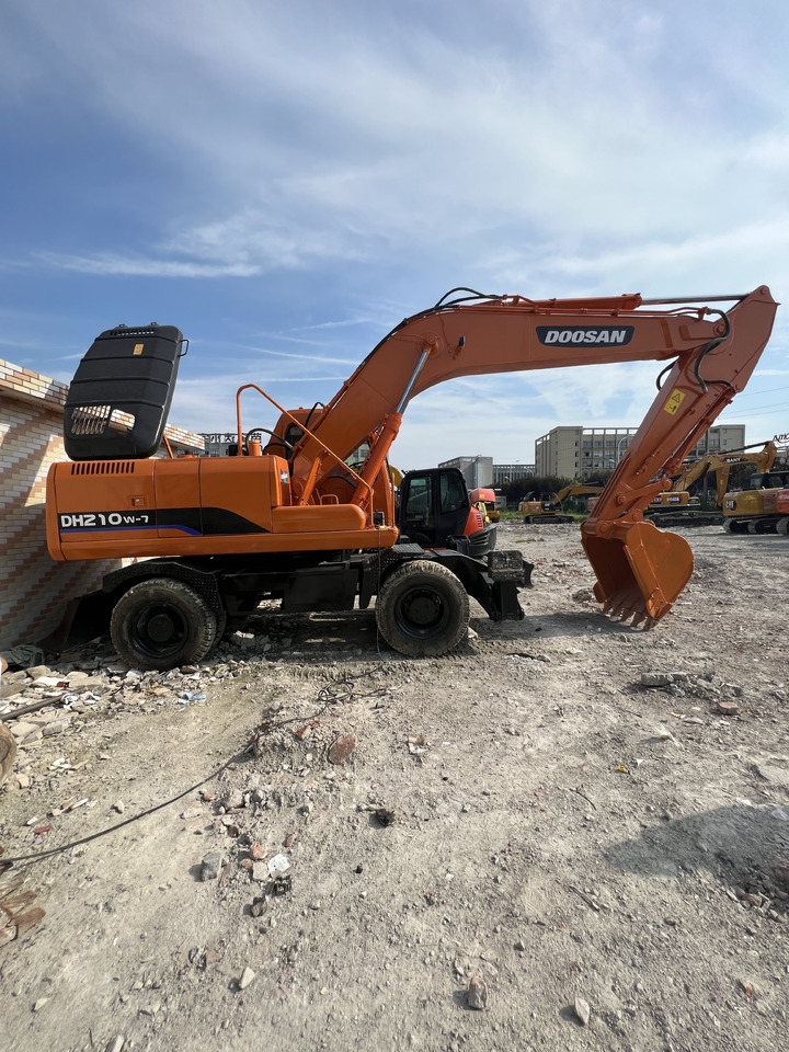 DOOSAN DX210 - מחפר גלגלים: תמונה 2 DOOSAN DX210 - מחפר גלגלים: תמונה 2