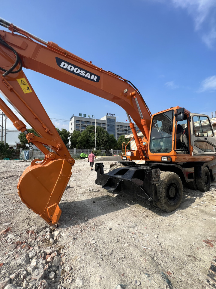 DOOSAN DX210 - מחפר גלגלים: תמונה 1 DOOSAN DX210 - מחפר גלגלים: תמונה 1