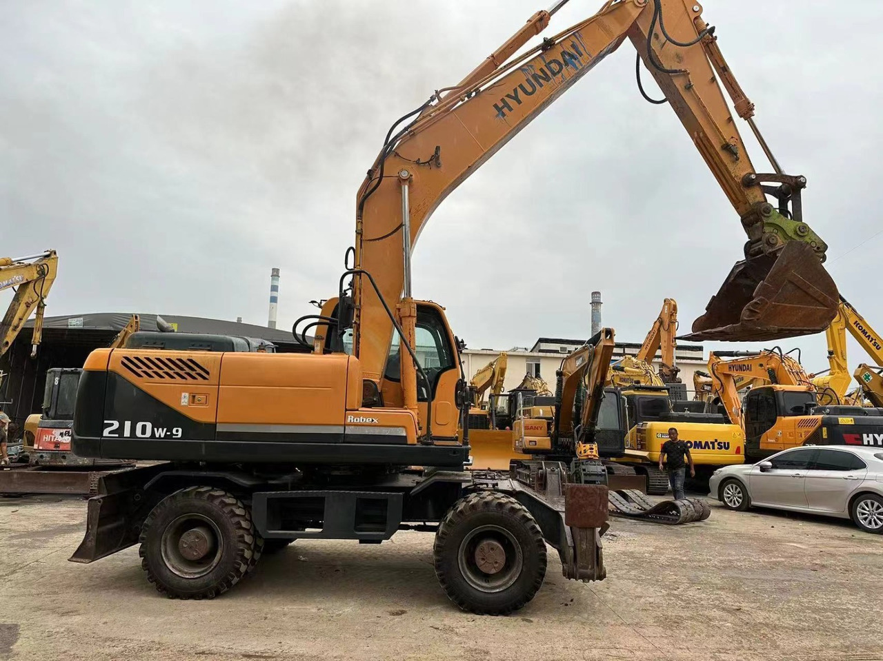 Hyundai 210w-9 - מחפר גלגלים: תמונה 1 Hyundai 210w-9 - מחפר גלגלים: תמונה 1