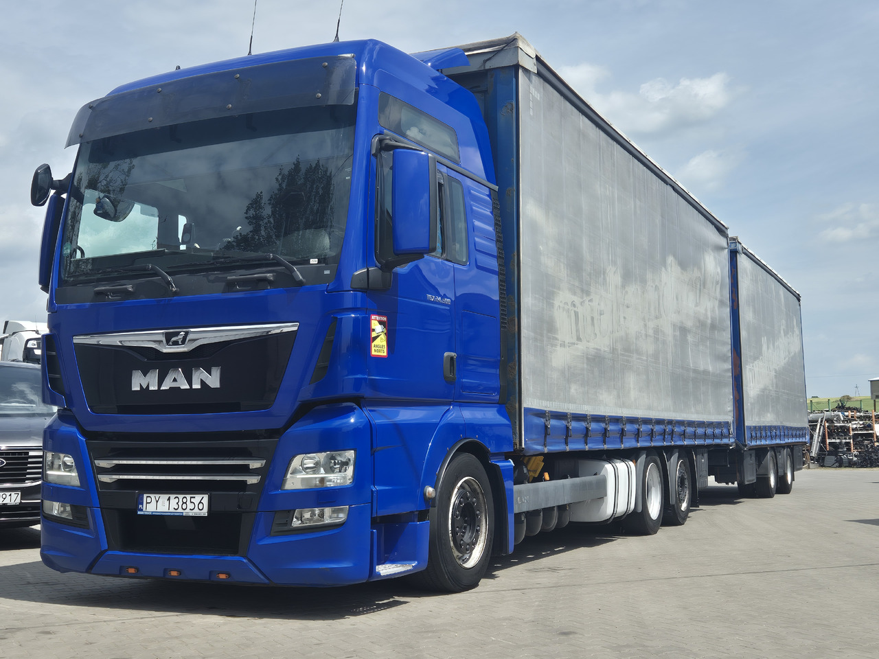 MAN tgx 24,500 - משאית וילונות צד: תמונה 1 MAN tgx 24,500 - משאית וילונות צד: תמונה 1