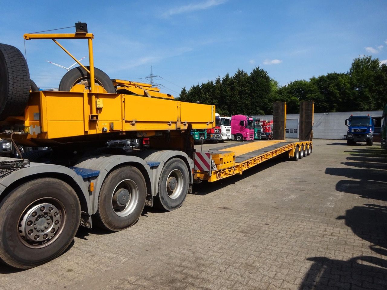 Faymonville 4 Achser Tiefbett abnehmbarem S-Hals ausziehbar - סמיטריילר עם מטען נמוך: תמונה 2 Faymonville 4 Achser Tiefbett abnehmbarem S-Hals ausziehbar - סמיטריילר עם מטען נמוך: תמונה 2