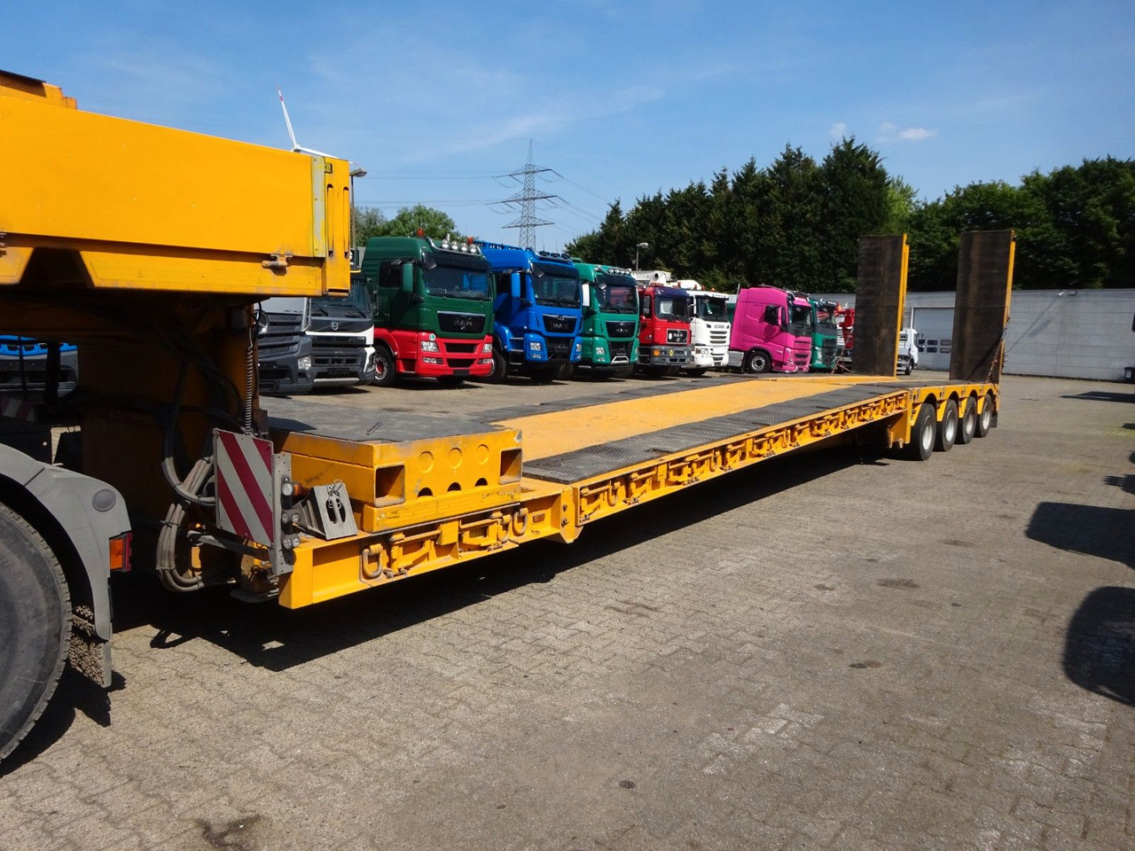 Faymonville 4 Achser Tiefbett abnehmbarem S-Hals ausziehbar - סמיטריילר עם מטען נמוך: תמונה 1 Faymonville 4 Achser Tiefbett abnehmbarem S-Hals ausziehbar - סמיטריילר עם מטען נמוך: תמונה 1