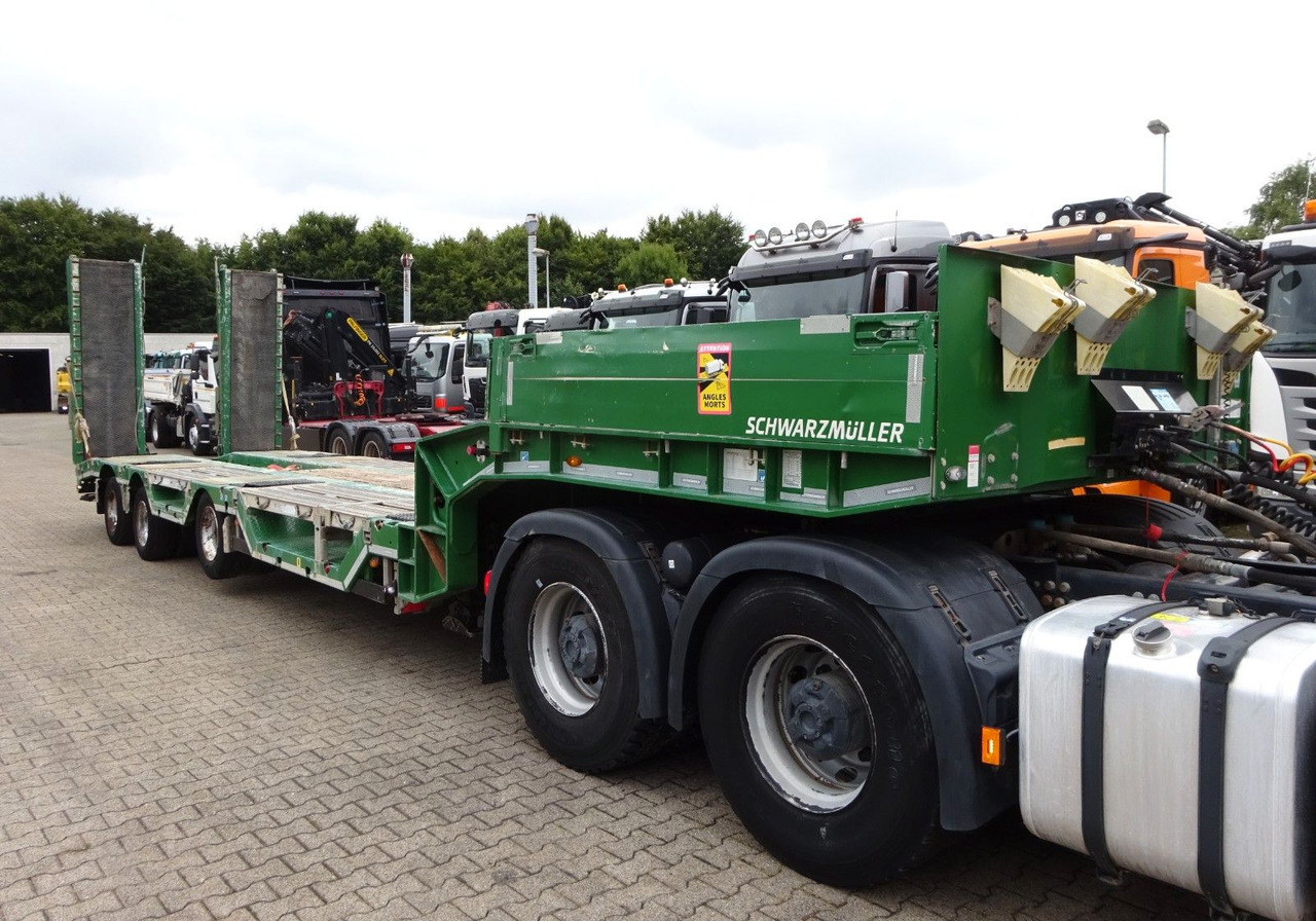 Schwarzmüller Tieflader Auflieger mit 2 Hydrl. Rampen - סמיטריילר עם מטען נמוך: תמונה 4 Schwarzmüller Tieflader Auflieger mit 2 Hydrl. Rampen - סמיטריילר עם מטען נמוך: תמונה 4