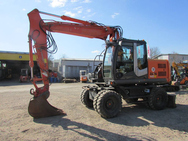 Hitachi ZX 140 W-3 Mobilbagger 45.000 EUR / Klima - מחפר גלגלים: תמונה 1 Hitachi ZX 140 W-3 Mobilbagger 45.000 EUR / Klima - מחפר גלגלים: תמונה 1