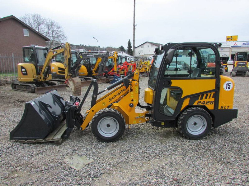 Schäffer 2428 SLT Schmalspur Radlader 32.500 - מעמיס רצועות קומפקטי: תמונה 5 Schäffer 2428 SLT Schmalspur Radlader 32.500 - מעמיס רצועות קומפקטי: תמונה 5